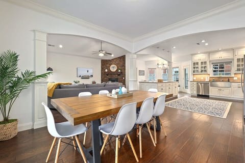 To the left of our entryway, you'll see our open-concept dining area, kitchen and living room.