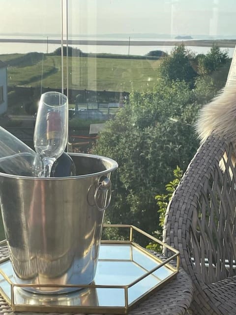 Enjoy a chilled glass of wine with a view