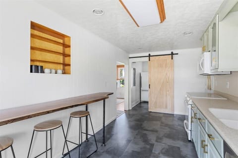 Spacious Kitchen with lots of seating options.