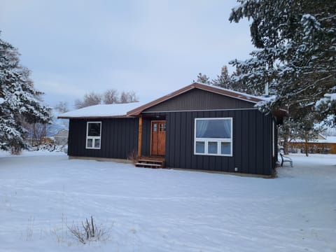 Scotch Pines House-front with new steel siding, 