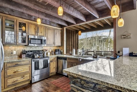 Kitchen with the biggest window over the sink you could imagine! 