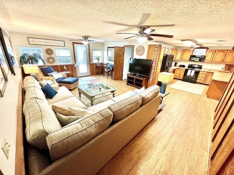 Open space, with kitchen + living room, great for family fun and entertainment.