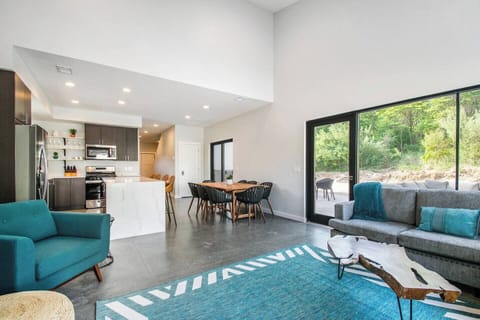 Living room looking at the kitchen and dining table