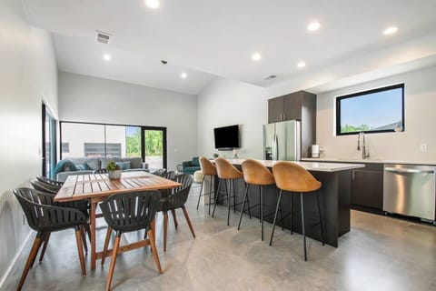 Kitchen and dining area looking at the pool