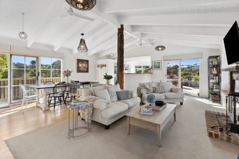 This classic home captures the essence of indoor-outdoor beachside living, filled with natural light and refreshing sea breezes