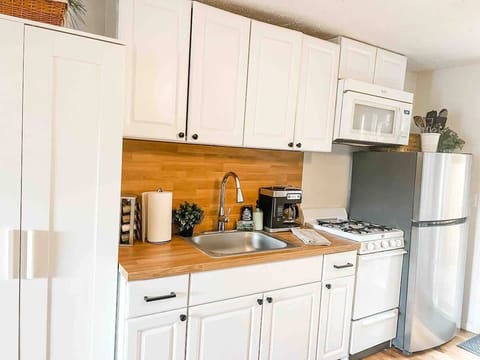 Kitchen with storage cabinet
