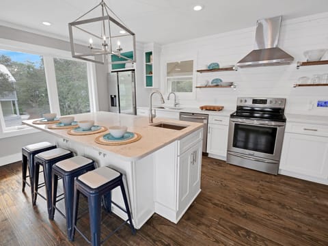 Updated Kitchen with Bar Stools for Four