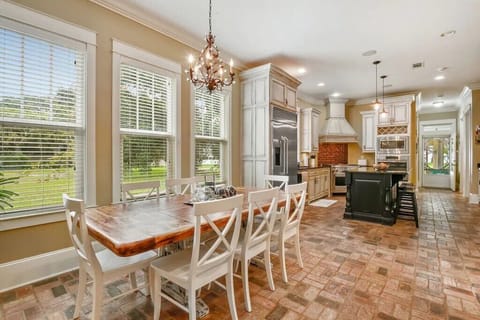 Dining table seats 8 + 3 seats at the bar.