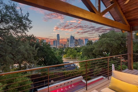 Primary Bedroom Covered Balcony with outdoor living and best views in Austin.  Downtown Retreat Sleeps 24