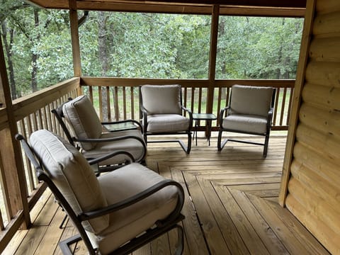 Outdoor seating and corn hole make it a great place to hang out.