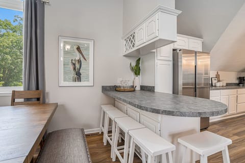 Versatile Dining: Gather and Share Meals with Extra Seating at the Countertop