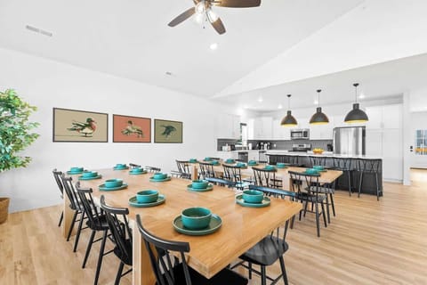 Solid oak dining tables with plenty of seating for a large group