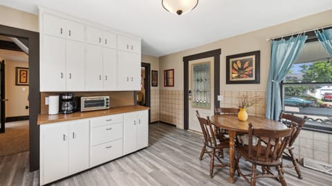 The kitchen exits onto the cute porch.