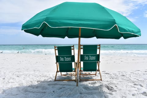 Relax on the beach with chairs & umbrella service provided, view from the condo!