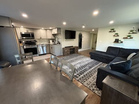 Dining table for 6, living room, kitchen.