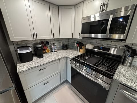 Keurig + K cups, creamer, sugar, ice maker, gas stove, many kitchen essentials!