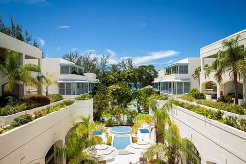 Soak up lush courtyard views framed by airy balconies.