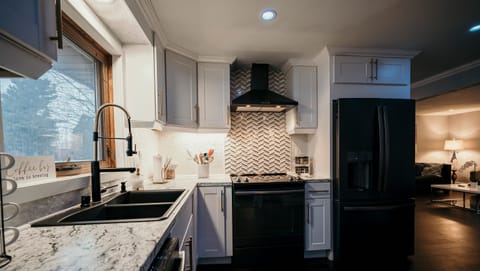 Black stainless appliances in kitchen!
