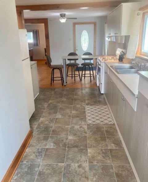 Kitchen with lots of cabinet space. Dishes, pots and pans provided.
