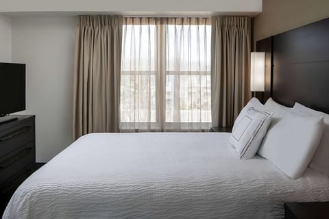 Stretch out in a spacious suite with lounge and work area.