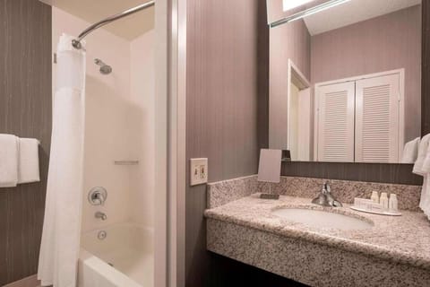 Full bathroom with a shower/tub. Basic toiletries and towels are provided