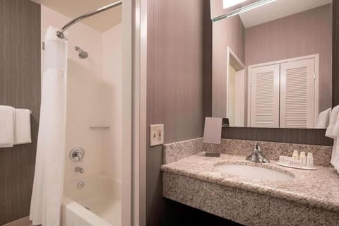 Full bathroom with a shower/tub. Basic toiletries and towels are provided