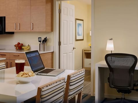 Plan your day comfortably with a workspace steps from the kitchen.