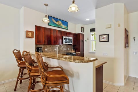 Well equipped kitchen featuring stainless steel appliances.