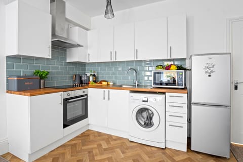 Fully equipped kitchen with  little treats 