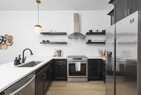 The kitchen is fully-stocked and ideal for anyone who enjoys cooking & convening. Well-equipped with high-end appliances and all the essentials.