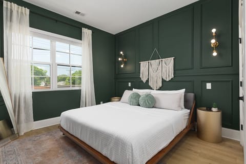 Primary bedroom with a comfortable king bed, ensuite bath, and plenty of closet space for your clothes.