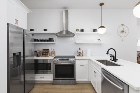 Fully-stocked kitchen with new dishware, utensils & appliances for all your cooking needs!