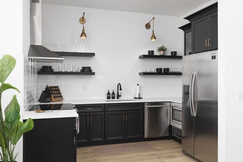 Our kitchen is well-equipped for you to cook a great meal - high-end appliances, cookware, & spices.