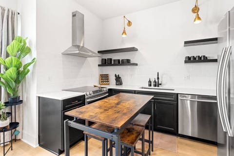 Seating for 4 at the kitchen table! Our kitchen is well-equipped for you to cook a great meal - high-end appliances, cookware, & spices.