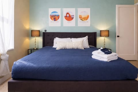 Bedroom with comfortable queen bed and fresh linens
