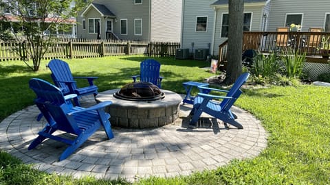Back yard fire pit for evening enjoyment. Burning wood is provided. 