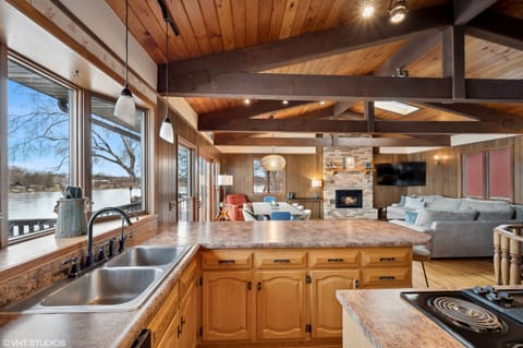 Enjoy conversations with everyone from the kitchen