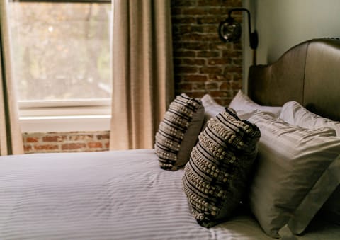 Elegant King bed featuring a plush king-sized bed,