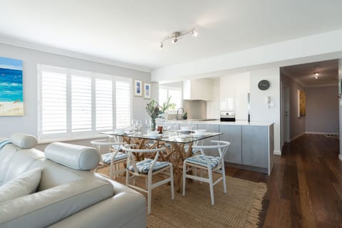 Bright kitchen and dining with coastal vibes.