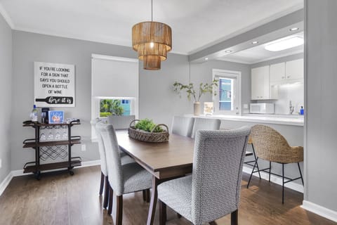 This comfortable dining room is perfect for meals and games; Unit B