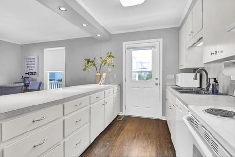 Well stocked galley style kitchen; Unit B