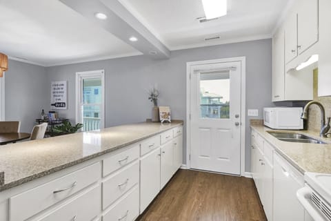 Well stocked galley style kitchen; Unit A