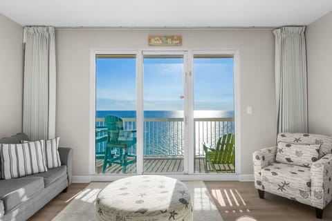 Living Area with Panoramic Ocean Views, Balcony Access, Sleeper Sofa and Flat Screen TV