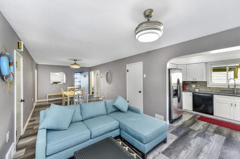 View from living room and kitchen with electronic gas fireplace