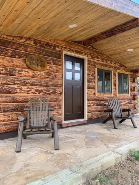 Handcrafted rustic log cabin. Your place to sit and enjoy.