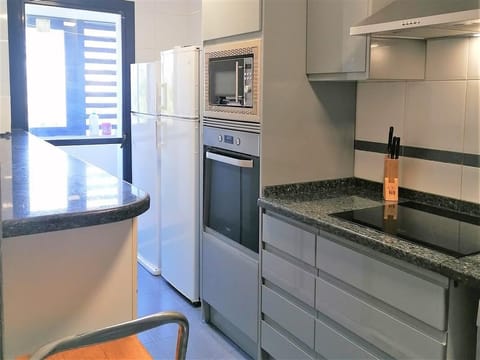 Modern kitchen is fully equipped with all the appliances