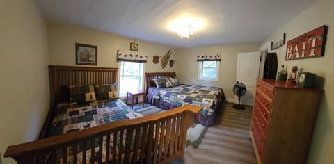 upstairs bedroom with 2 queen beds