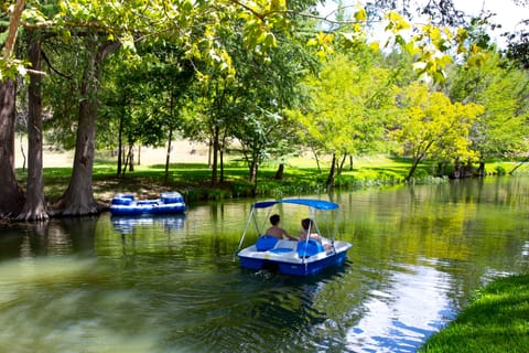 Paddleboats and waterside docks at both houses