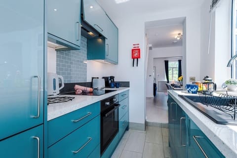 The kitchen benefits from all the essentials for a short or long stay.