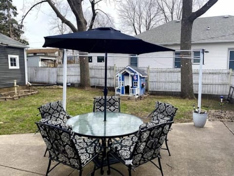 Enjoy the private patio while kids play in the fenced back yard